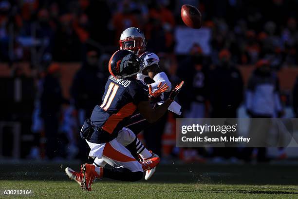 Wide receiver Jordan Norwood of the Denver Broncos attempts to catch a punt in the first quarter but miffs, leading to a New England Patriots...