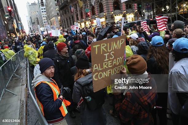 Hundreds of New Yorkers mark International Migrants Day by protesting outside Trump Tower after marching from UN on December 18, 2016 in New York...