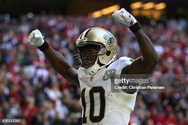 Wide receiver Brandin Cooks of the New Orleans Saints celebrates after scoring on a 45 yard touchdown reception against the Arizona Cardinals during...