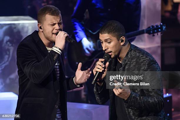 Tay Schmedtmann and Andreas Bourani perform during the ''The Voice Of Germany' Finals' on December 18, 2016 in Berlin, Germany.