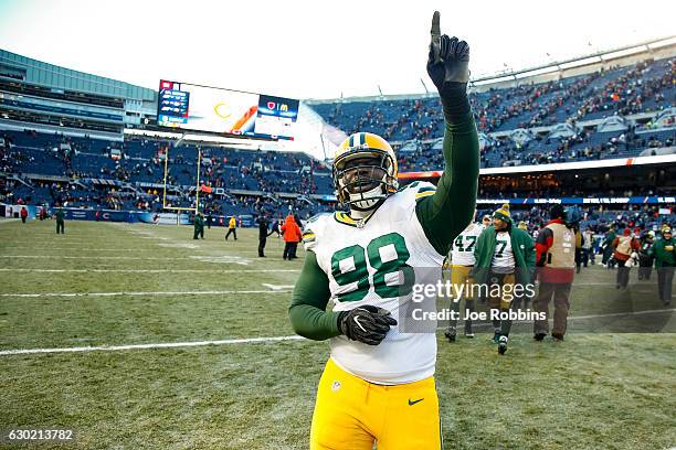 Letroy Guion of the Green Bay Packers reacts after the Green Bay Packers win the game against the Chicago Bears at Soldier Field on December 18, 2016...