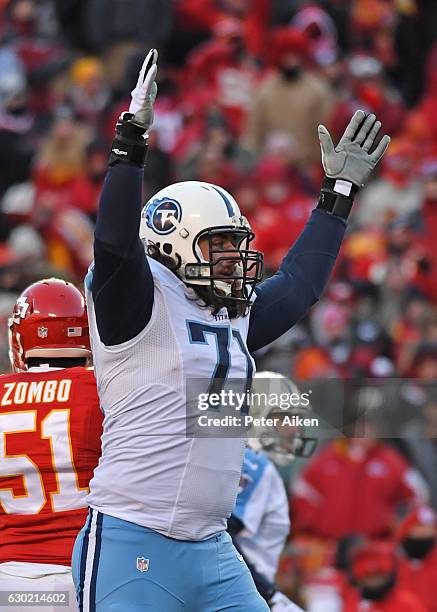 Offensive guard Dennis Kelly of the Tennessee Titans celebrates after the Titans beat the Kansas City Chiefs 19-17 on December 18, 2016 at Arrowhead...