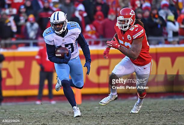 Wide receiver Kendall Wright of the Tennessee Titans rushes up field after catching a pass past linebacker Ramik Wilson of the Kansas City Chiefs...