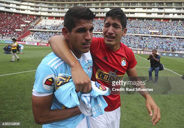 Luis Abram and Alexis Cossio of Sporting Cristal celebrate after winning a second leg final match between Sporting Cristal and FBC Melgar as part of...