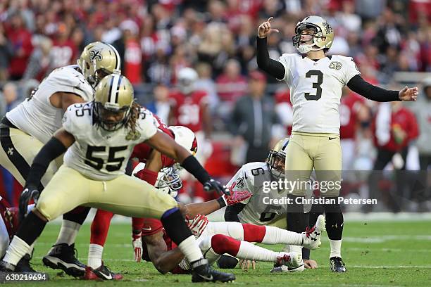 Kicker Wil Lutz of the New Orleans Saints kicks a field goal during the third quarter of the NFL game against the Arizona Cardinals at the University...