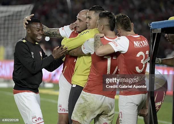 Omar Perez of Santa Fe celebrates with teammates after winning a second leg final match between Santa Fe and Deportes Tolima as part of Liga Aguila...