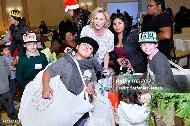 Julie Bowen and guests attend Baby2Baby Holiday Party Presented By Old Navy at Montage Beverly Hills on December 18, 2016 in Beverly Hills,...