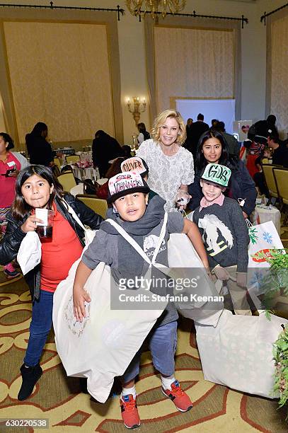 Julie Bowen and guests attend Baby2Baby Holiday Party Presented By Old Navy at Montage Beverly Hills on December 18, 2016 in Beverly Hills,...