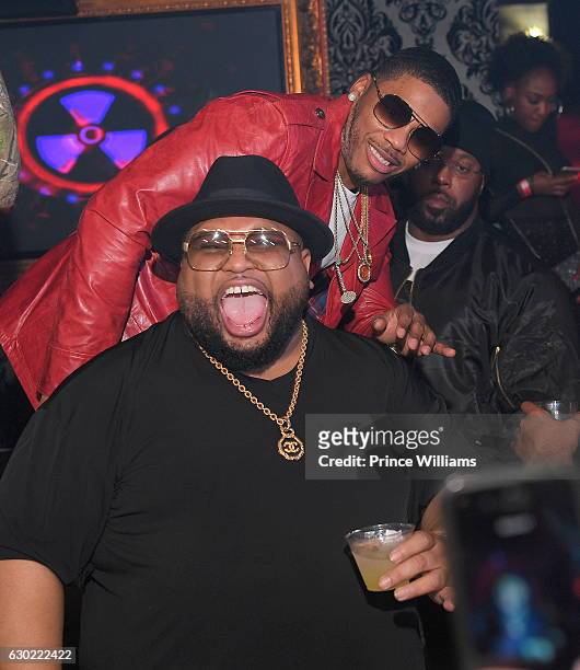 Nelly and Jazzy Pha attend the Nely and Kenny Burns Takeover at Compound on December 18, 2016 in Atlanta, Georgia.