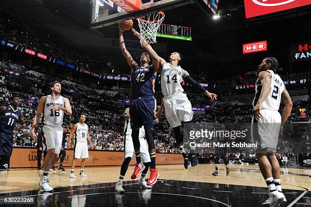 Alexis Ajinca of the New Orleans Pelicans shoots the ball against the San Antonio Spurs on December 18, 2016 at the AT&T Center in San Antonio,...