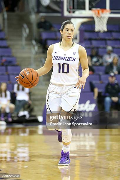 Washington's Kelsey Plum brings the ball down court during an NCAA women's basketball game between the Savannah State Tigers and the Washington...