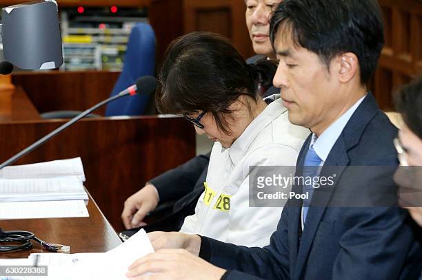 Choi Soon-Sil, the jailed confidante of disgraced South Korean President Park Geun-Hye, appears for the first day of her trial at the Seoul Central...