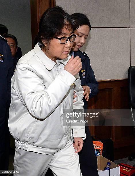 Choi Soon-Sil, the jailed confidante of disgraced South Korean President Park Geun-Hye, appears for the first day of her trial at the Seoul Central...