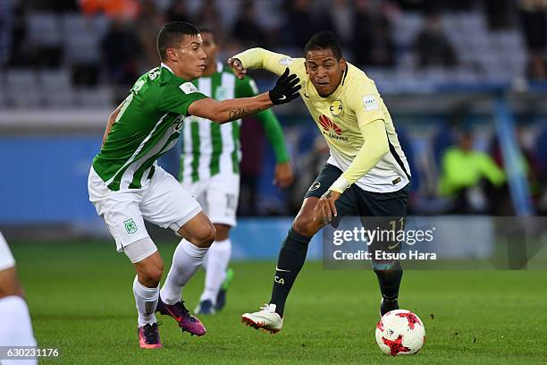 Michael Arroyo of Club America and Matheus Uribe of Atletico Nacional compete for the ball during the FIFA Club World Cup 3rd place match between...