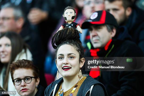 Supporter of Toulouse with a puppet representing a player of Toulouse on her head during the European Champions Cup match between Stade Toulousain...