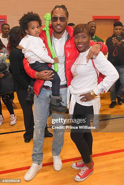 Future, Future Zahir Wilburn and Stephanie Jester attend A Winter wishland presented By Future at Bessie Branham Park on December 18, 2016 in...