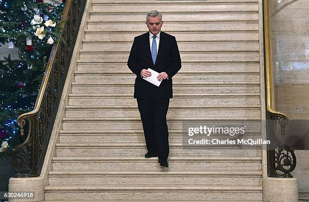 And former DETI minister Jonathan Bell cuts a lonely figure as he makes his way to address the media at Stormont on December 19, 2016 in Belfast,...