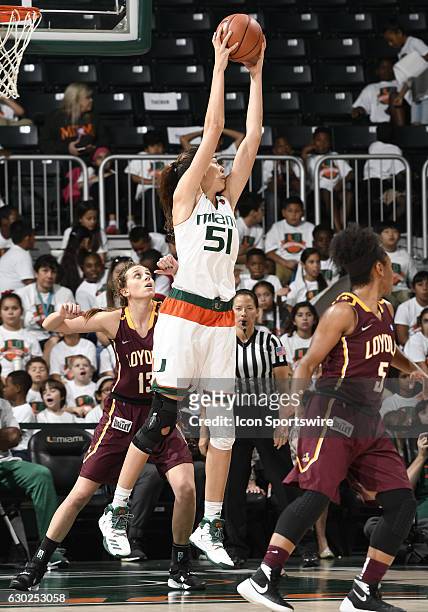 Miami center Serena-Lynn Geldof grabs a rebound during an NCAA basketball game between Loyola Chicago University Ramblers and the University of Miami...