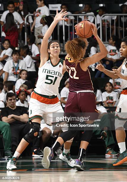 Miami center Serena-Lynn Geldof plays defense during an NCAA basketball game between Loyola Chicago University Ramblers and the University of Miami...