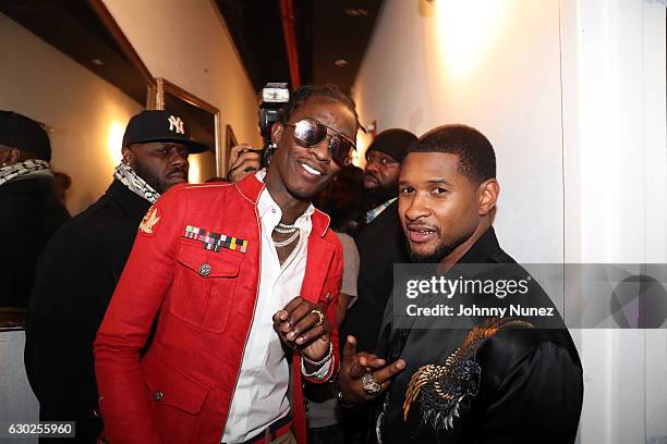 Young Thug and Usher backstage at Terminal 5 on December 18, 2016 in New York City.