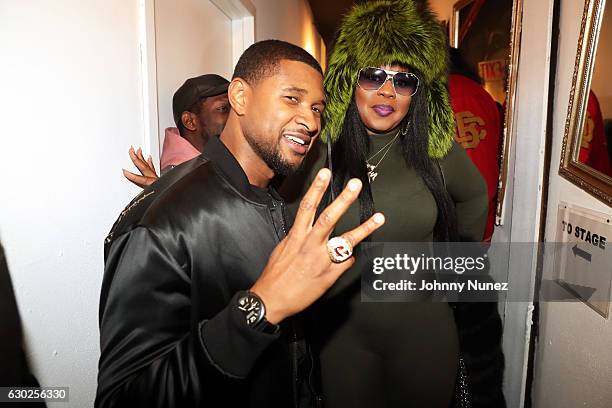 Usher and Remy Ma backstage at Terminal 5 on December 18, 2016 in New York City.