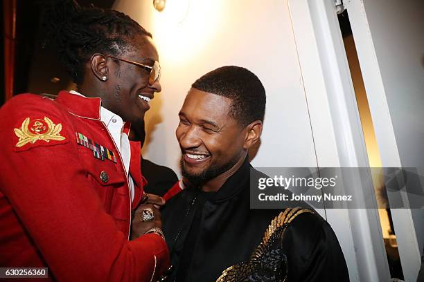 Young Thug and Usher backstage at Terminal 5 on December 18, 2016 in New York City.