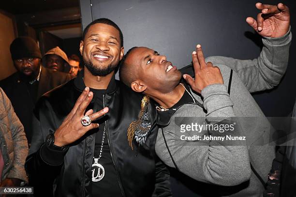 Usher and DJ Whoo Kid backstage at Terminal 5 on December 18, 2016 in New York City.