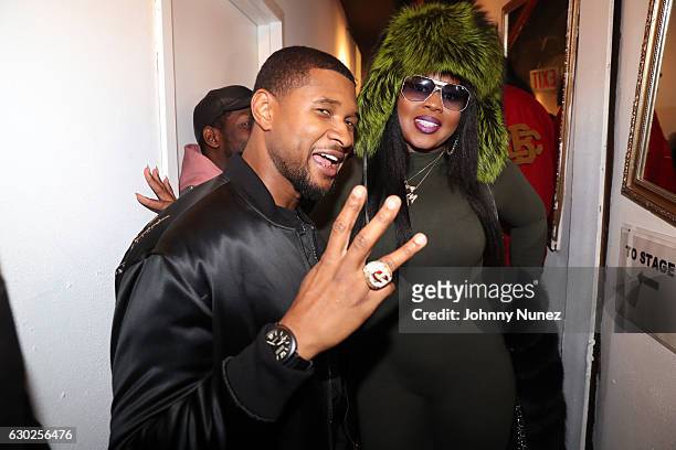 Usher and Remy Ma backstage at Terminal 5 on December 18, 2016 in New York City.