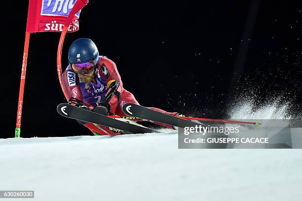 S Tommy Ford competes in the Men's Parallel Giant Slalom at the FIS Alpine World Cup in Alta Badia in the Italian Alps on December 19, 2016. / AFP /...