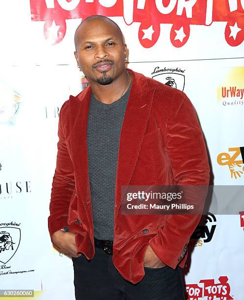 Player Eric King arrives at eZWayCares Community Santa Toy Drive on December 18, 2016 in Los Angeles, California.