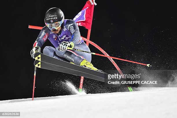 France's Cyprien Sarrazin competes in the Men's Parallel Giant Slalom at the FIS Alpine World Cup in Alta Badia in the Italian Alps on December 19,...