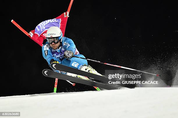 Norway's Kjetil Jansrud competes in the Men's Parallel Giant Slalom at the FIS Alpine World Cup in Alta Badia in the Italian Alps on December 19,...