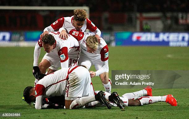 Jacques Zoua Daogari of 1. FC Kaiserslautern celebrates after scoring a goal during the Second Bundesliga match between 1. FC Nuernberg and 1. FC...