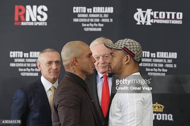 Miguel Cotto, Jerry Jones and James Kirkland pose during a press conference to promote the fight between Miguel Cotto and James Kirkland at the Ford...