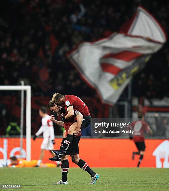 Dave Bulthuis and Laszlo Sepsi celebrate after the second goal during the Second Bundesliga match between 1. FC Nuernberg and 1. FC Kaiserslautern at...