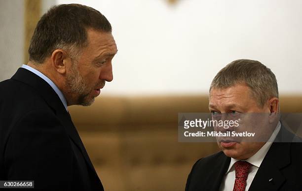 Russian billionaires and businessmen Oleg Deripaska and Igor Zyuzin attend the meeting with representatives of business community and business...