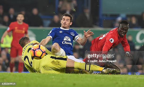 Sadio Mane of Liverpool with Leighton Baines And goalkeeper Maarten Stekelenburg of Everton during the Premier League match between Everton and...