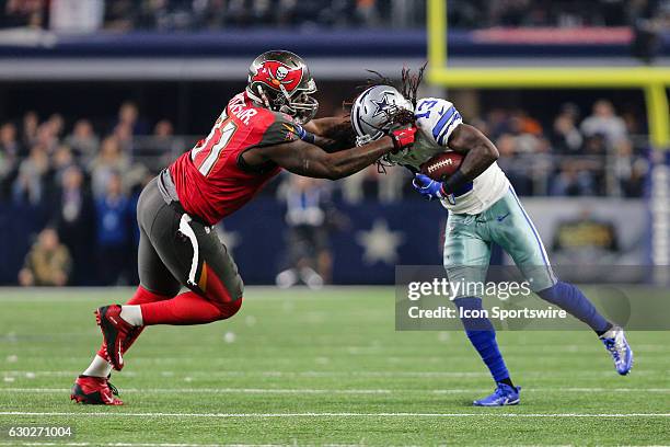 Tampa Bay Buccaneers defensive end Robert Ayers tackles Dallas Cowboys wide receiver Lucky Whitehead on an end-around during the game between the...