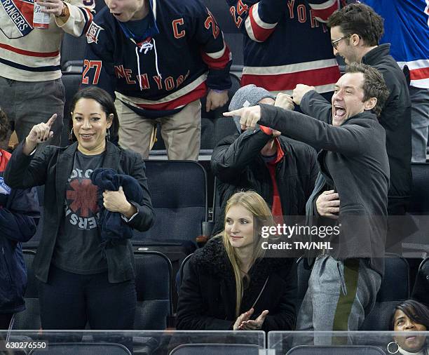 Selenis Leyva, Philipa Coan, and Jude Law are seen at Madison Square Garden on December 18, 2016 in New York City.