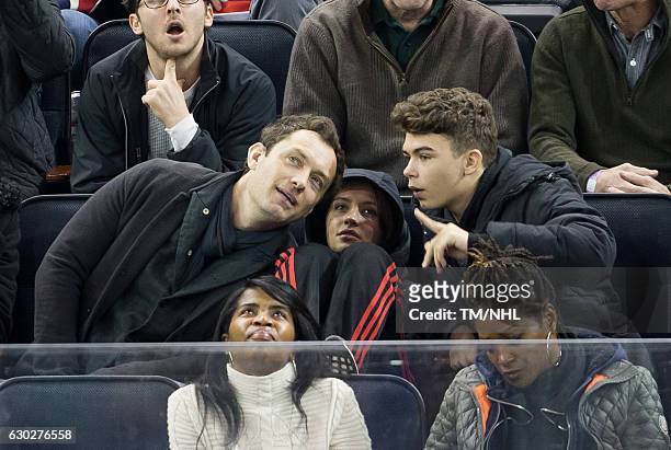 Jude Law, Iris Law, and Rudy Law are seen at Madison Square Garden on December 18, 2016 in New York City.