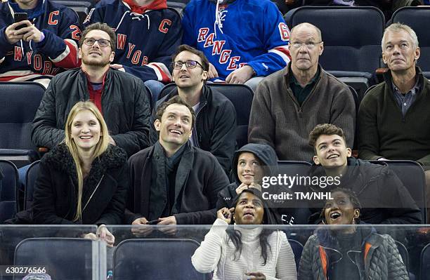 Phillipa Coan Jude Law, Iris Law, and Rudy Law are seen at Madison Square Garden on December 18, 2016 in New York City.