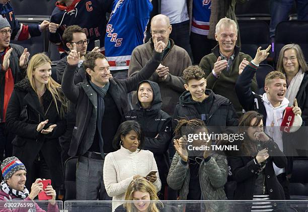 Philipa Coan, Jude Law, Iris Law, Rafferty Law and Rudy Law are seen at Madison Square Garden on December 18, 2016 in New York City.