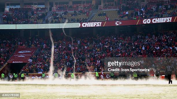 The frigid cold with steam coming from the field creates odd formations during an NFL game between two division-leading teams, the Tennessee Titans...