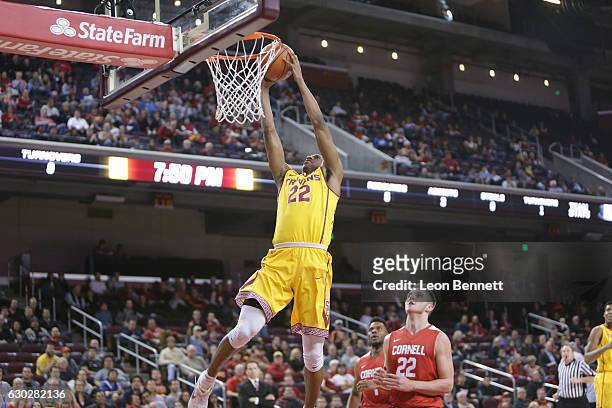 De'Anthony Melton of the USC Trojans handles the ball against the Cornell Big Red during a NCAA college basketball game at Galen Center on December...