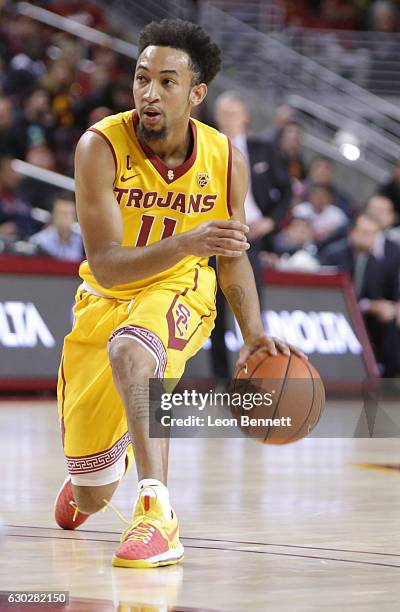 Jordan McLaughlin of the USC Trojans handles the ball against the Cornell Big Red during a NCAA college basketball game at Galen Center on December...