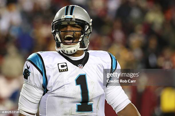 Quarterback Cam Newton of the Carolina Panthers reacts during the closing minutes of the fourth quarter against the Washington Redskins at FedExField...