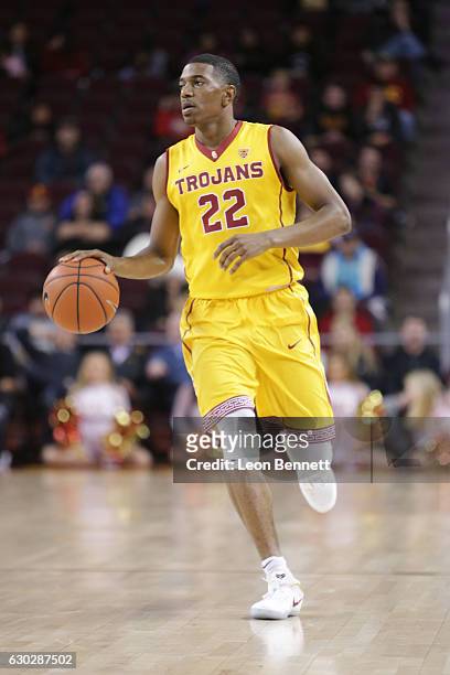 De'Anthony Melton of the USC Trojans handles the ball against the Cornell Big Red during a NCAA college basketball game at Galen Center on December...