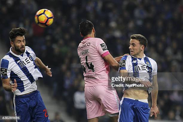 Porto's Brazilian defender Felipe jumps with Chaves players Freire and Porto's Portuguese midfielder Diogo Jota during the Premier League 2016/17...