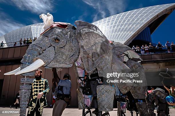 The largest-ever performing African elephant puppet Queenie pictured parading at the Sydney Opera House. Part of the CIRCUS 1903 troupe ahead of...