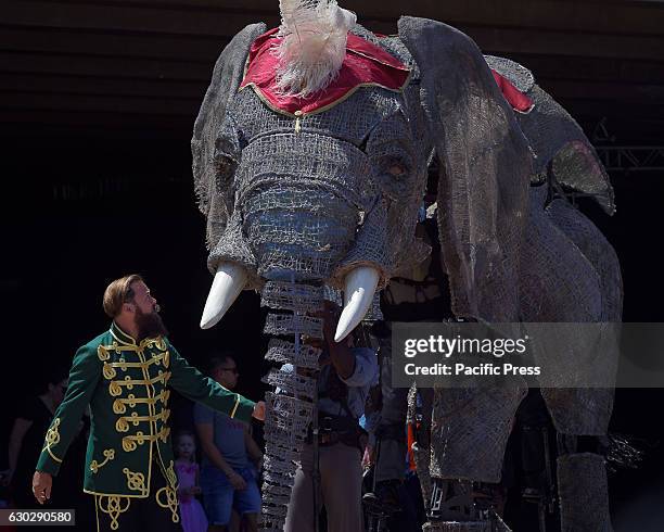 The largest-ever performing African elephant puppet Queenie pictured parading at the Sydney Opera House. Part of the CIRCUS 1903 troupe ahead of...